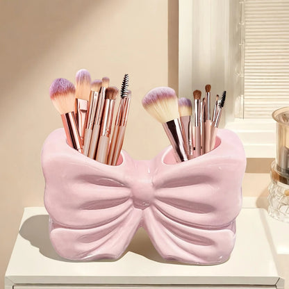 Bow brush holder